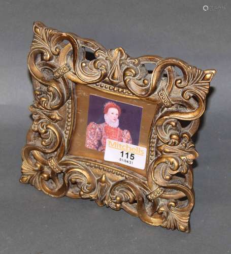 A gilt resin square photograph frame of mannerist design,