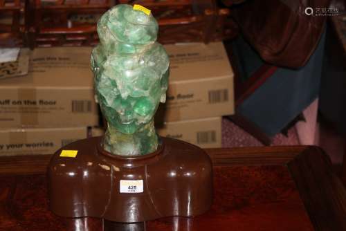 An early 20th century Chinese Fluorite and brown painted woo...