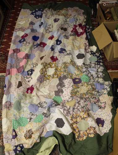 A 20th century patchwork coverlet, constructed in hexagonal ...