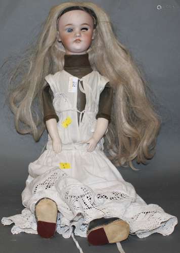 A 19th century Halbig bisque porcelain headed doll, with blu...