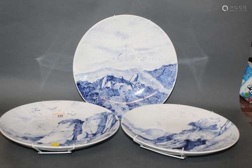 A set of four late Victorian blue and white pottery circular...