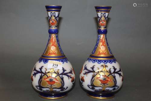 A pair of Macintyre pottery Aurelian ware bottle shaped vase...