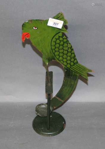 A green painted Folk Art novelty balancing bird figure. 35 c...