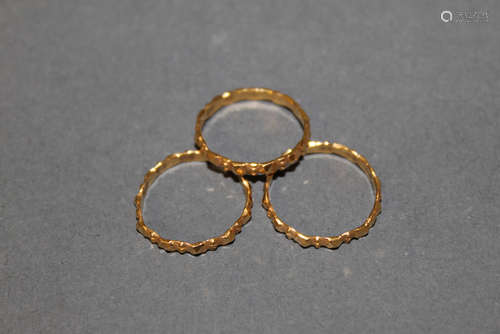 A set of three eastern gold coloured metal (thought higher c...