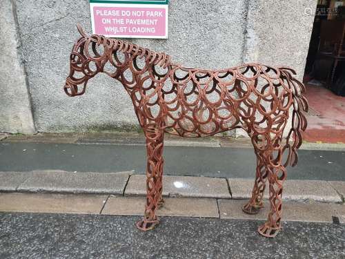A welded foal garden feature composed of reclaimed horseshoe...