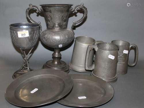 A Victorian pewter rowing trophy, the bowl with open cartouc...