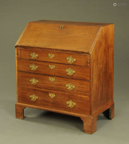 A George III mahogany bureau,