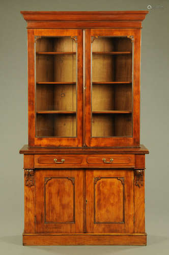 A Victorian mahogany bookcase in two sections,