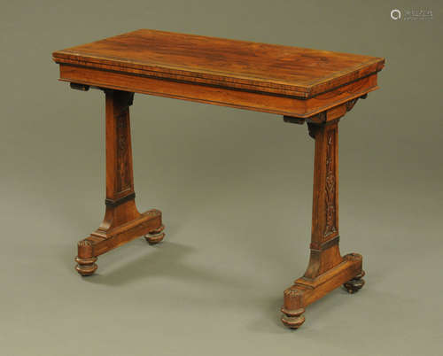 A William IV rosewood card table stamped T & G Seddon, with ...