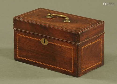 A George III mahogany tea caddy, with brass carrying handle,