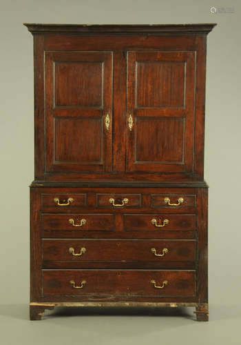 An 18th century oak livery cupboard,