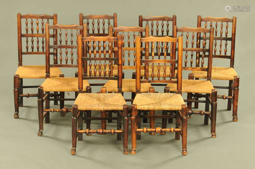 A matched set of nine 19th century rush seated spindle backe...