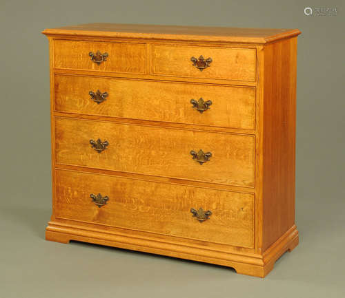 An oak chest of drawers,