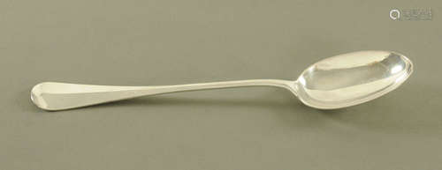 An Edward VII silver rat tail pattern gravy or basting spoon...