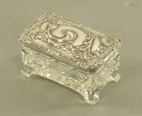 An Edward VII embossed silver topped and cut glass dressing ...