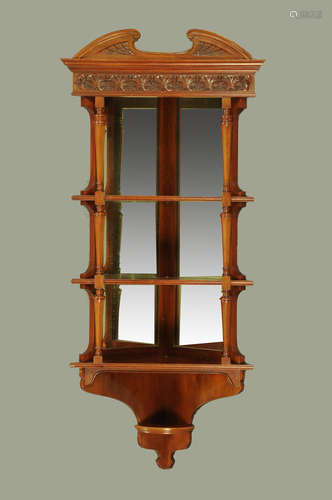 A late Victorian walnut hanging corner cabinet,