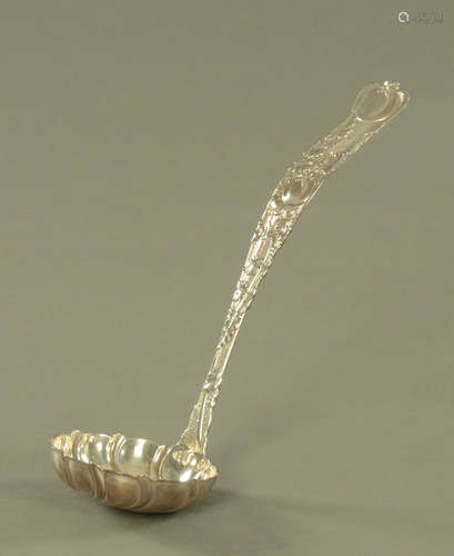 An early 20th century American cast silver punch ladle by Ti...