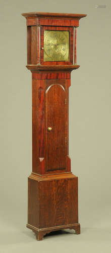 An early 19th century oak and mahogany banded longcase clock...