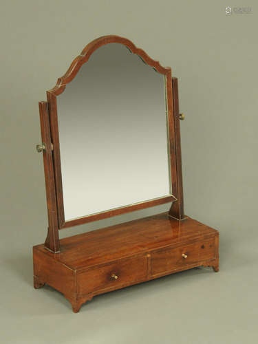 A George III mahogany toilet mirror,