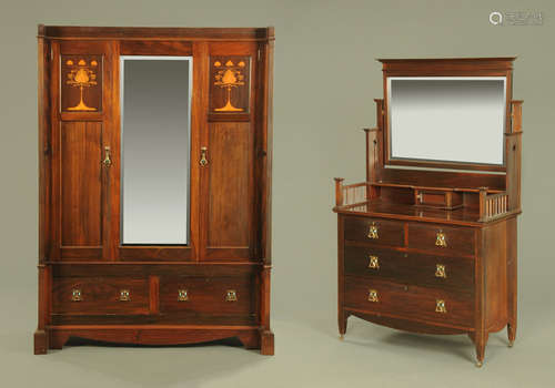 An Arts and Crafts inlaid mahogany wardrobe and dressing tab...