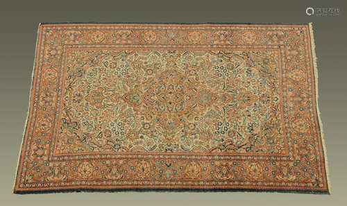 An antique Hamadan rug, with centre rectangular panel and re...