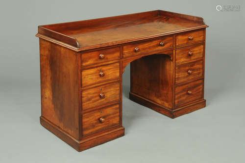 A Victorian mahogany kneehole desk,