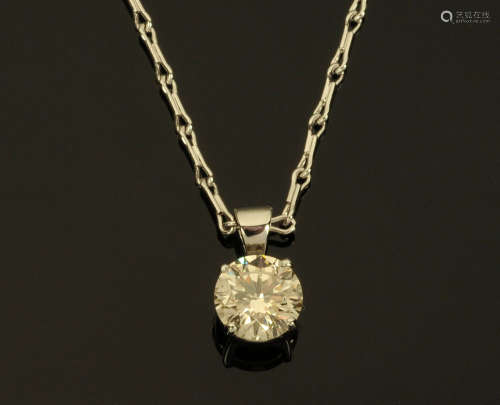 An 18 ct white gold diamond set pendant on chain, diamond we...