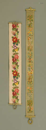 Two woolwork tapestry wall hangings, with brass hangers. Lon...