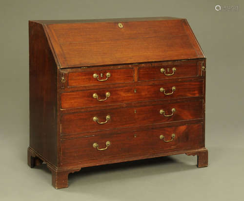 A George III mahogany bureau,