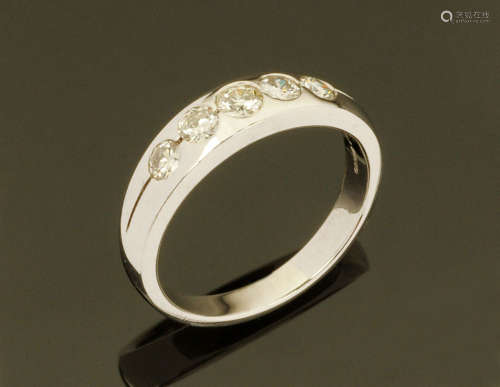 An 18 ct white gold five stone half eternity ring, set with ...
