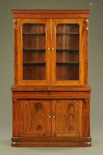 A Victorian rosewood bookcase on cupboard,