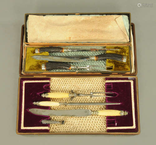 A cased horn handled carving set, together with another part...