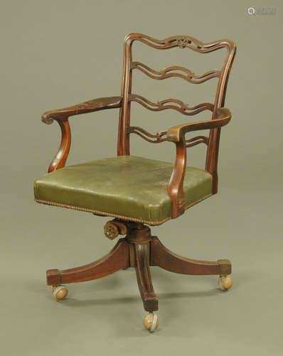 A mahogany Hepplewhite style revolving desk chair,