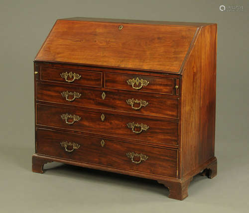 A George III mahogany bureau,