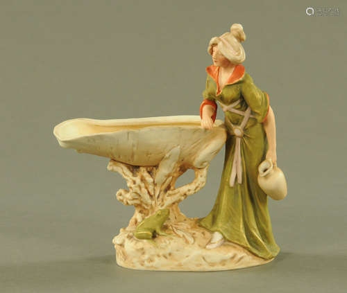 A Royal Dux figure water carrier by Nautilus shell, impresse...