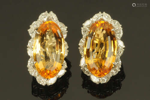 A pair of 18 ct gold citrine and diamond earrings, length 25...