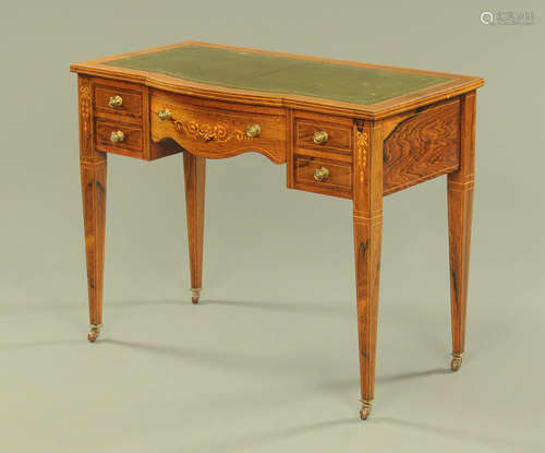 An Edwardian inlaid rosewood desk,