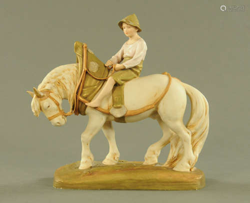 A Royal Dux carthorse with boy rider, impressed 1693 and wit...