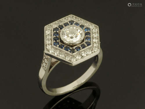 An Art Deco style diamond and sapphire ring, the centre diam...