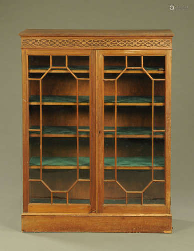 A Late Victorian glazed bookcase,