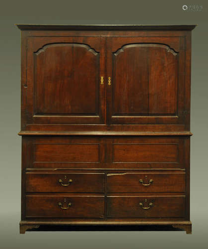 An 18th century oak livery cupboard,