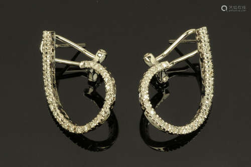 A pair of 18 ct gold diamond earrings, of shaped teardrop ou...
