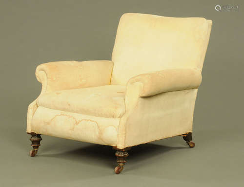 A Victorian Howard style stuffover armchair,