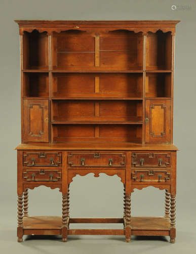 A Jacobean style oak dresser,