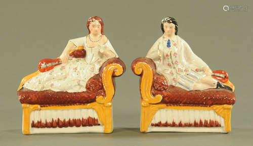 A pair of Staffordshire figures, male and female mandolin pl...