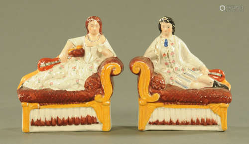 A pair of Staffordshire figures, male and female mandolin pl...