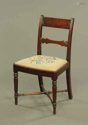 A Regency mahogany occasional chair, with bowed top rail,