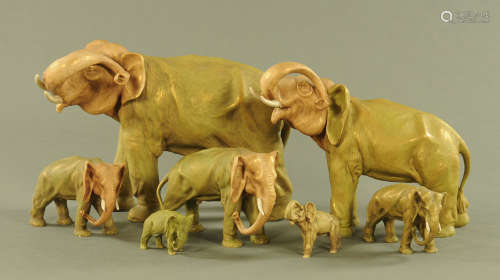 A group of five Royal Dux graduated elephants, each in stand...
