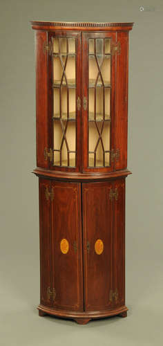 A 19th century mahogany standing corner cabinet,