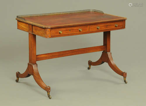 A Regency mahogany library table, freestanding with three qu...